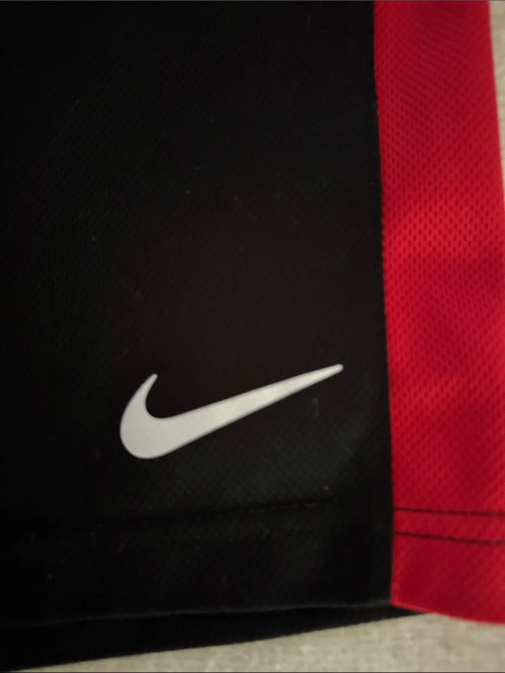 Nike Kids Black Shorts with Red Side Panels